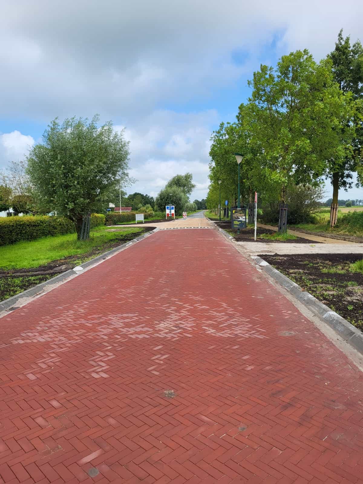 Herinrichting Tramstrjitte te Nijland Súdwest Fryslân asfalt fundering straatbakstenen 13